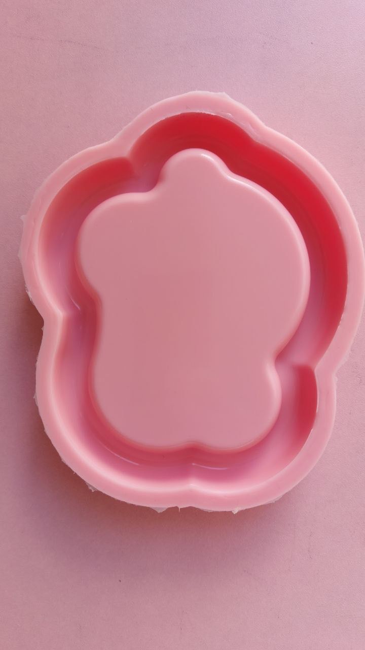 Pink silicone mold with an irregular and streamlined design