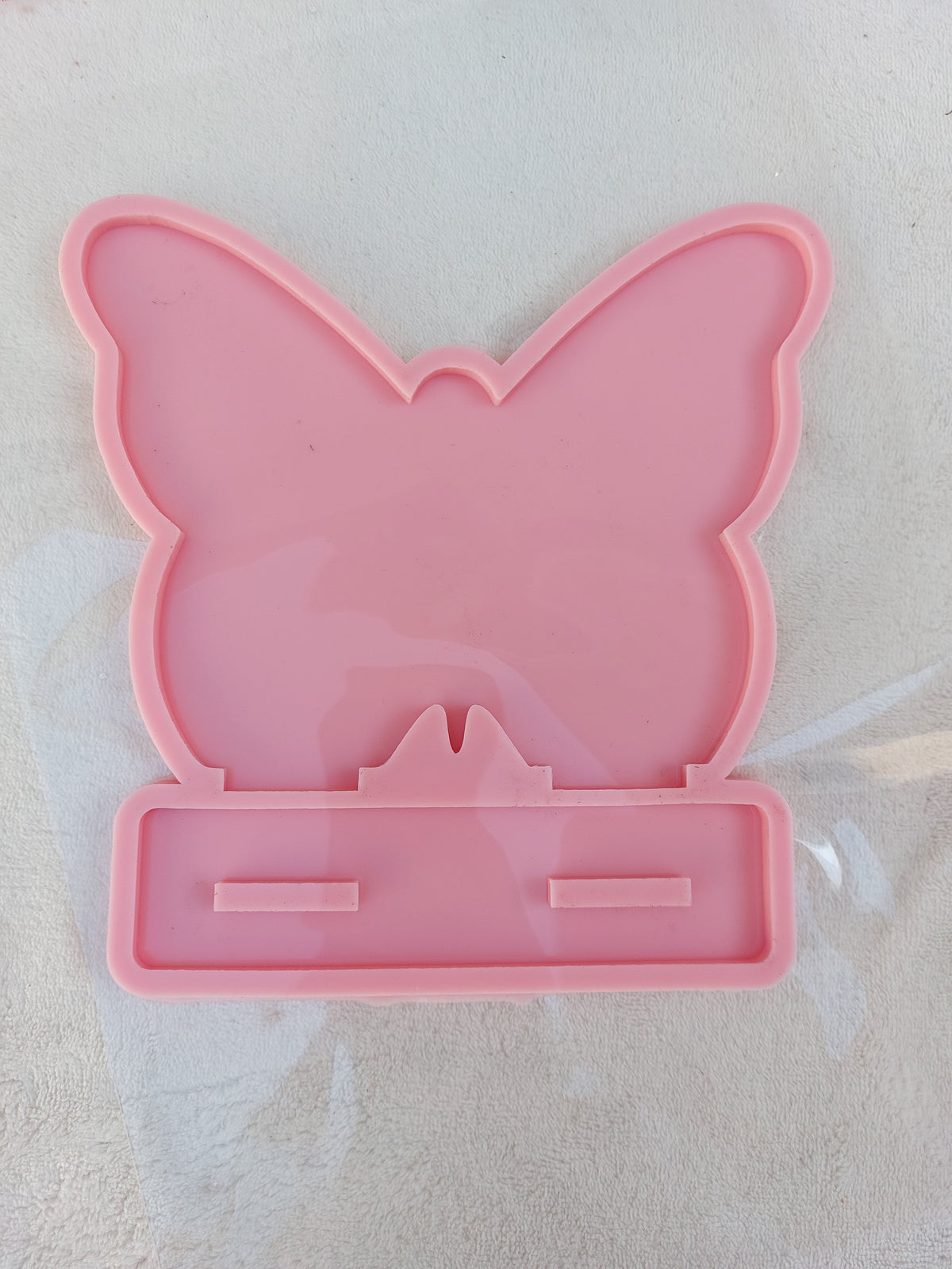A silicone mold used to make earring organizers, accessories, welcome signs, desk boards, desk calendars, decorations, nameplates, logos, small picture frames, light bases, or souvenirs. Designed for casting resin, wax, or ceramic