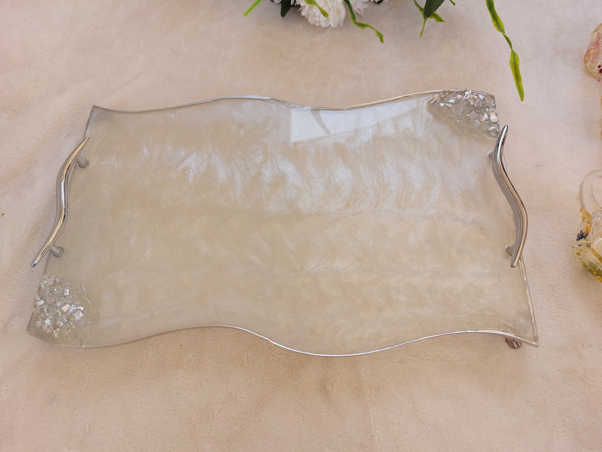 A sleek, rectangular silicone mold with an artistic touch, featuring wavy, wave-like edges on the top and bottom.  Size 42