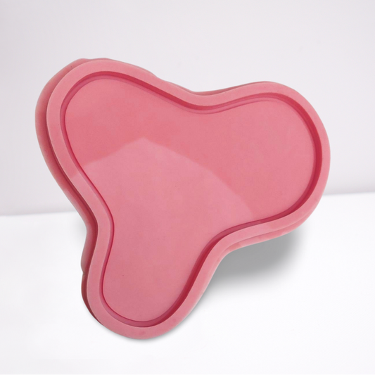 A silicone mold specially designed for artistic casting work such as resin, plaster, or pottery. The mold features an irregular shape with smooth, curved edges, somewhat resembling a simplified flower with three wide petals.